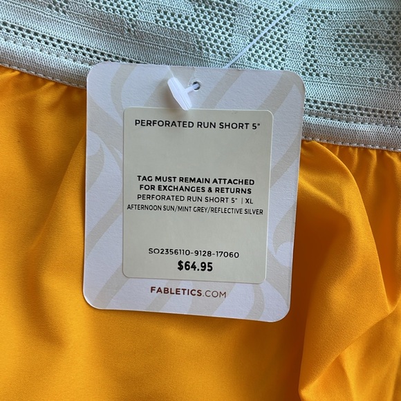 NWT women’s XL Fabletics 5” perforated run shorts - built in compression shorts. - Picture 3 of 4